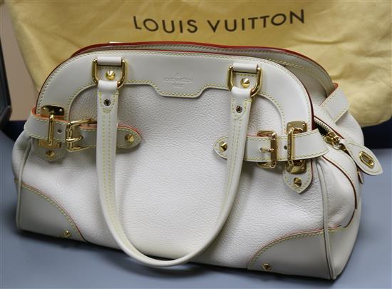 A Louis Vuitton Le Radieux handbag, cream with burgundy trim and matching purse